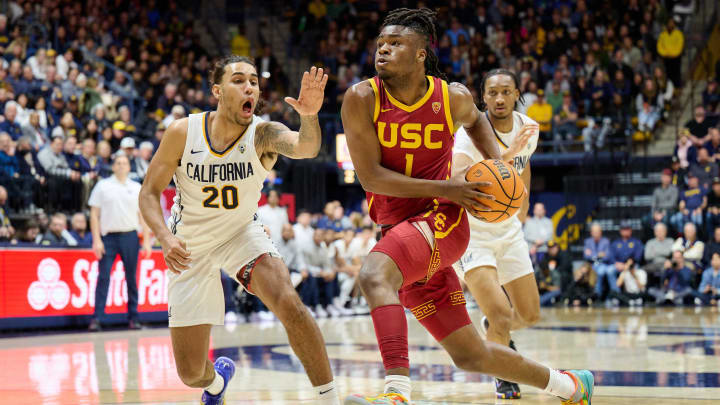 Feb 7, 2024; Berkeley, California, USA; USC Trojans guard Isaiah Collier (1) dribbles the ball against California Golden Bears guard Jaylon Tyson (20) during the second half of the game between the California Golden Bears and the USC Trojans at Haas Pavilion.  Mandatory Credit: Robert Edwards-USA TODAY Sports