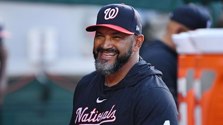 Jul 2, 2024; Washington, District of Columbia, USA; Washington Nationals manager Dave Martinez (4) smiles in the dugout before a game against the New York Mets at Nationals Park