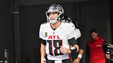Dec 8, 2024; Minneapolis, Minnesota, USA; Atlanta Falcons quarterback Kirk Cousins (18) enters the field before the game against the Minnesota Vikings at U.S. Bank Stadium. Mandatory Credit: Jeffrey Becker-Imagn Images