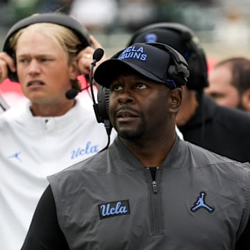Oct 11, 2025; East Lansing, Michigan, USA; UCLA Bruins interim head coach Tim Skipper looks up at the video board in the fourth quarter at Spartan Stadium. Mandatory Credit: Brendan Mullin-Imagn Images