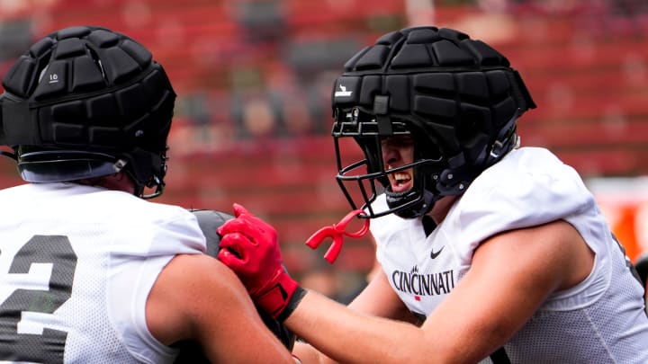 Cincinnati Bearcats tight ends Michael McCalmont (82) and Gavin Grover participate in drills during football practice, Wednesday, July 31, 2024, at Nippert Stadium in Cincinnati.