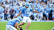 Sep 13, 2025; Chapel Hill, North Carolina, USA; North Carolina Tar Heels place kicker Rece Verhoff (90) kicks a field goal in the first quarter at Kenan Stadium. Mandatory Credit: Bob Donnan-Imagn Images