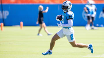Carolina Panthers wide receiver Adam Thielen runs after a catch during practice at training camp.