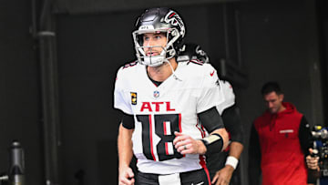 Dec 8, 2024; Minneapolis, Minnesota, USA; Atlanta Falcons quarterback Kirk Cousins (18) enters the field before the game against the Minnesota Vikings at U.S. Bank Stadium. Mandatory Credit: Jeffrey Becker-Imagn Images