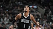 Dec 31, 2024; San Antonio, Texas, USA;  San Antonio Spurs center Victor Wembanyama (1) looks up in the first half against the LA Clippers at Frost Bank Center. Mandatory Credit: Daniel Dunn-Imagn Images
