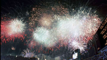 The opening ceremony of the 1992 Summer Olympics at Estadi Ol’mpic de Montju•c, Barcelona, Spain, July 25, 1992. The Games were formally opened by King Juan Carlos I. As mandated by the Olympic Charter, the proceedings included hoisting of the flags and the parade of athletes, with an artistic spectacle to showcase the host nation's culture and history.