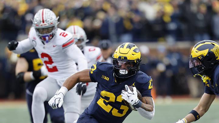 Nov 29, 2025; Ann Arbor, Michigan, USA; Michigan Wolverines running back Jordan Marshall (23) runs the ball in the first half against the Ohio State Buckeyes at Michigan Stadium. Mandatory Credit: Rick Osentoski-Imagn Images