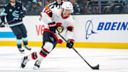 Dec 17, 2024; Seattle, Washington, USA;  Ottawa Senators forward Nick Cousins (21) skates with the puck against the Seattle Kraken at Climate Pledge Arena. Mandatory Credit: Stephen Brashear-Imagn Images