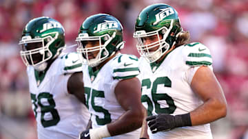 Morgan Moses, Alijah Vera-Tucker, and Joe Tippmann