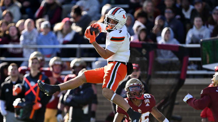 Nov 24, 2023; Chestnut Hill, Massachusetts, USA; Miami Hurricanes wide receiver Xavier Restrepo (7) makes a catch against the Boston College Eagles during the first half at Alumni Stadium. Mandatory Credit: Brian Fluharty-USA TODAY Sports