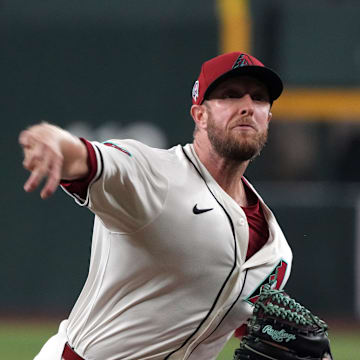 Sep 11, 2024; Phoenix, Arizona, USA; Arizona Diamondbacks pitcher Merrill Kelly (29) throws against the Arizona Diamondbacks in the first inning at Chase Field. Mandatory Credit: Rick Scuteri-Imagn Images