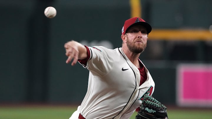 Sep 11, 2024; Phoenix, Arizona, USA; Arizona Diamondbacks pitcher Merrill Kelly (29) throws against the Arizona Diamondbacks in the first inning at Chase Field. Mandatory Credit: Rick Scuteri-Imagn Images