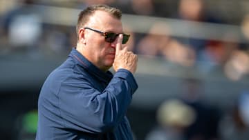 Oct 4, 2025; West Lafayette, Indiana, USA; Illinois Fighting Illini head coach Bret Bielema watches warm-ups before the game against the Purdue Boilermakers at Ross-Ade Stadium.