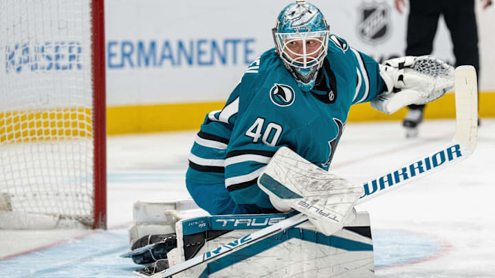 Apr 16, 2025; San Jose, California, USA;  San Jose Sharks goaltender Alexandar Georgiev (40) reacts after the shot on goal against the Edmonton Oilers during the first period at SAP Center at San Jose. Mandatory Credit: Neville E. Guard-Imagn Images