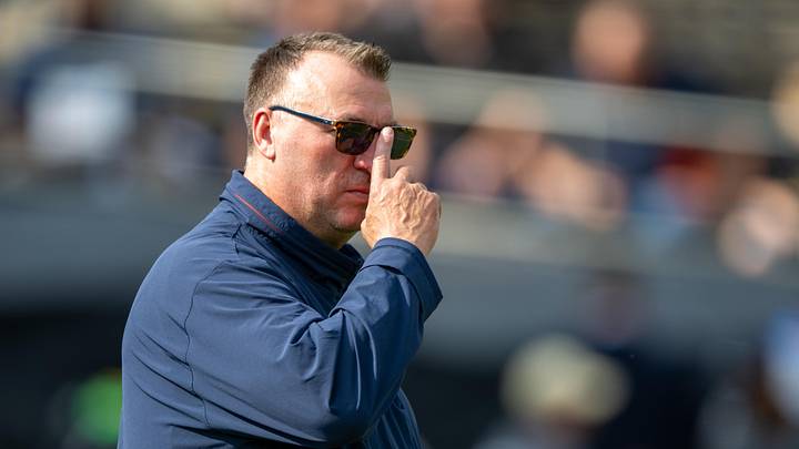 Oct 4, 2025; West Lafayette, Indiana, USA; Illinois Fighting Illini head coach Bret Bielema watches warm ups before the game against the Purdue Boilermakers at Ross-Ade Stadium. Mandatory Credit: Marc Lebryk-Imagn Images
