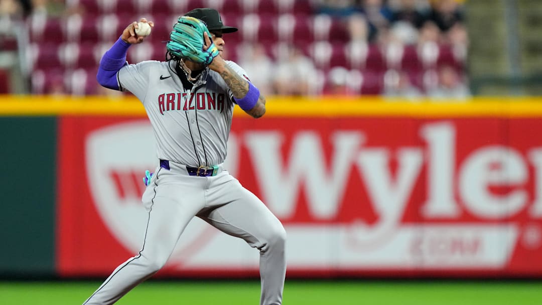 Arizona Diamondbacks second base Ketel Marte (4) throws to first to complete a double play in the seventh inning of a baseball game between the Arizona Diamondbacks and Cincinnati Reds, Tuesday, May 7, 2024, at Great American Ball Park in Cincinnati. Arizona Diamondbacks second base Ketel Marte (4) throws to first to complete a double play in the seventh inning of a baseball game between the Arizona Diamondbacks and Cincinnati Reds, Tuesday, May 7, 2024, at Great American Ball Park in Cincinnati.
