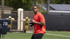 Justin Fields trains in Reebok apparel.