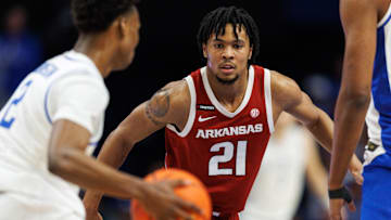 Feb 1, 2025; Lexington, Kentucky, USA; Arkansas Razorbacks guard D.J. Wagner (21) guards Kentucky Wildcats guard Jaxson Robinson (2) during the first half at Rupp Arena at Central Bank Center. Mandatory Credit: Jordan Prather-Imagn Images