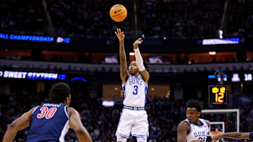 Mar 27, 2025; Newark, NJ, USA; Duke Blue Devils guard Isaiah Evans (3) shoots the ball against Arizona Wildcats forward Tobe Awaka (30) during the first half during an East Regional semifinal of the 2025 NCAA tournament at Prudential Center.