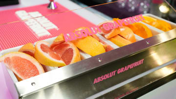 Cocktail garnish tray filled with grapefruit