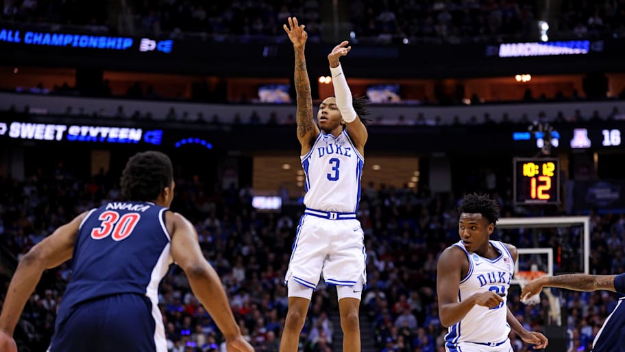 Duke guard Isaiah Evans shoots the ball against Arizona forward Tobe Awaka.
