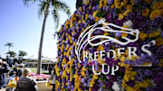 Oct 31, 2024; Del Mar, CA, USA; A Breederís Cup logo is shown on a backdrop of flowers ahead of the 2024 Breeders' Cup Championship at Del Mar Thoroughbred Club. 