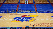 Dec 31, 2022; Lawrence, Kansas, USA; A general view of the center court logo prior to a game between the Kansas Jayhawks and Oklahoma State Cowboys at Allen Fieldhouse. Mandatory Credit: Denny Medley-Imagn Images