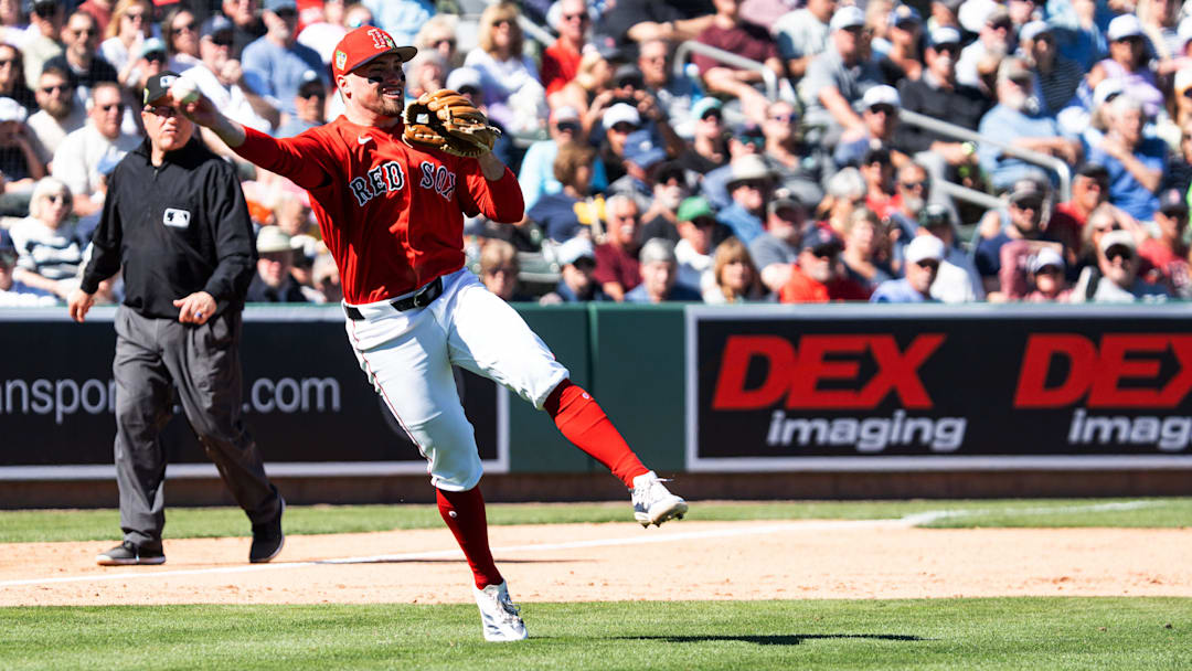 Caleb Durbin of the Boston Red Sox throws an out during spring training game against the Pittsburgh Pirates at JetBlue Park in Fort Myers on Tuesday, Feb. 24, 2026. I