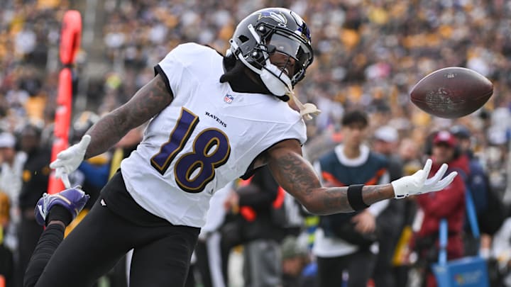 Nov 17, 2024; Pittsburgh, Pennsylvania, USA; Baltimore Ravens wide receiver Diontae Johnson (18) reaches for an incomplete pass against the Pittsburgh Steelers during the first quarter at Acrisure Stadium. Mandatory Credit: Barry Reeger-Imagn Images
