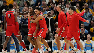 St. John's v Marquette; St. John's basketball celebrates after winning an overtime game against Marquette on the road