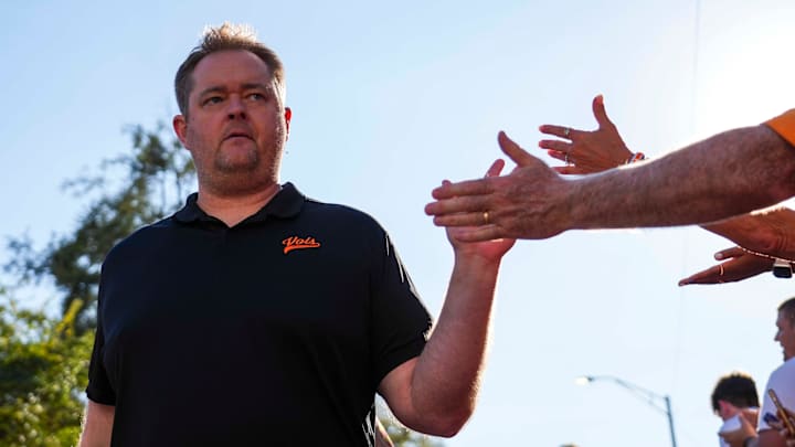 Tennessee head coach Josh Heupel high-fives fans during the Vol Walk before a game between Tennessee and Florida in Neyland Stadium, in Knoxville, Tenn., Oct. 12, 2024.