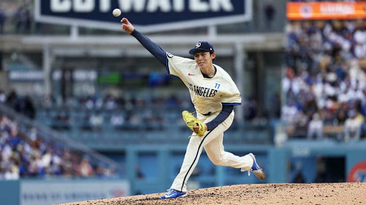 Apr 25, 2026; Los Angeles, California, USA; Los Angeles Dodgers starting pitcher Roki Sasaki (11) throws a pitch against the Chicago Cubs during the third inning at Dodger Stadium. Mandatory Credit: Kiyoshi Mio-Imagn Images
