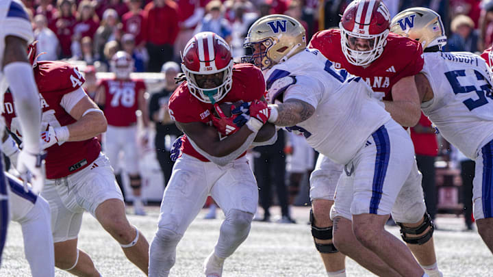 Oct 26, 2024; Bloomington, Indiana, USA; Indiana Hoosiers running back Justice Ellison (6) runs the ball during the fourth quarter against the Washington Huskies at Memorial Stadium. Mandatory Credit: Jacob Musselman-Imagn Images