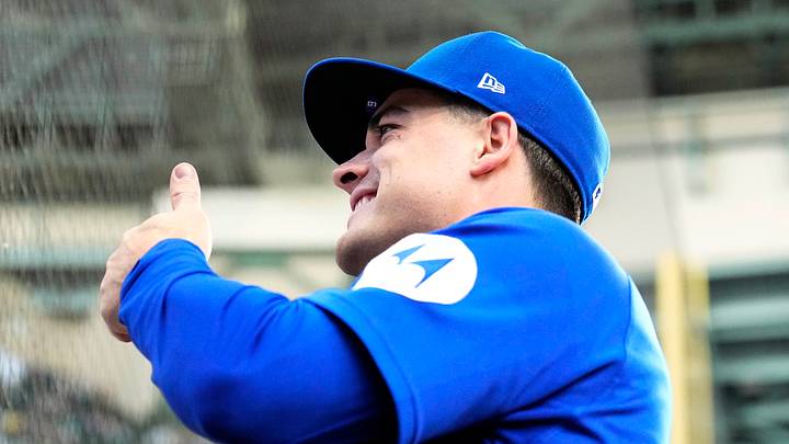 Jun 26, 2026; Milwaukee, Wisconsin, USA; Chicago Cubs right fielder Matt Shaw (6) gives a thumbs up for a fan photo before a game against the Milwaukee Brewers at American Family Field. Mandatory Credit: Michael McLoone-Imagn Images