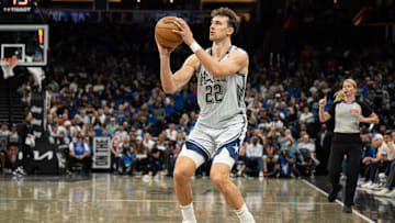 Mar 27, 2025; Orlando, Florida, USA; Orlando Magic forward Franz Wagner (22) shoots a three against the Dallas Mavericks in the fourth quarter at Kia Center. Mandatory Credit: Jeremy Reper-Imagn Images