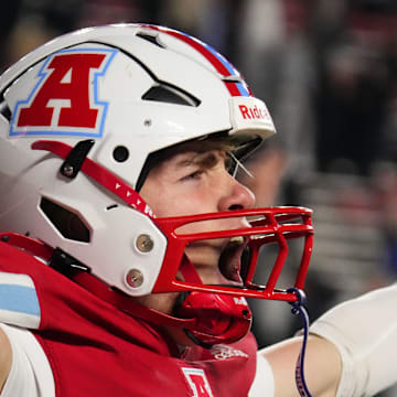 Arrowhead's Ryan Heiman (24) celebrates after returning a kickoff 76 yards for a touchdown, with 35 seconds on the clock, to secure a 18-15 victory over Bay Port in the WIAA Division 1 state football championship game at Camp Randall Stadium in Madison on Friday, Nov. 21, 2025.