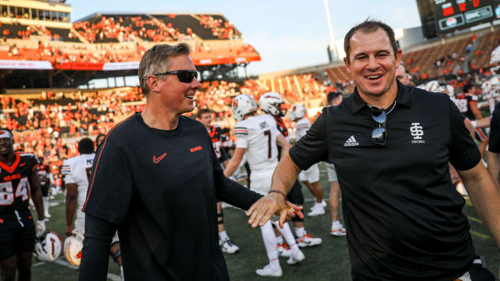 Oregon State Beavers head coach Trent Bray and Idaho State Bengals head coach Cody Hawkins shake hands at the end of the game on Saturday, Aug. 31, 2024 at Reser Stadium in Corvallis, Ore. Oregon State Beavers won the game 38-15.