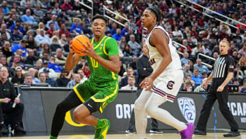 Mar 21, 2024; Pittsburgh, PA, USA; Oregon Ducks forward Kwame Evans Jr. (10) drives to the basket against South Carolina Gamecocks forward Collin Murray-Boyles (30) during the second half in the first round of the 2024 NCAA Tournament at PPG Paints Arena. Mandatory Credit: Gregory Fisher-USA TODAY Sports