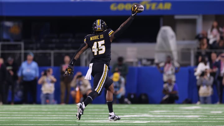 Dec 29, 2023; Arlington, TX, USA;  Missouri Tigers defensive lineman Joe Moore (45) celebrates recovering a fumble in the fourth quarter against the Ohio State Buckeyes at AT&T Stadium. Mandatory Credit: Tim Heitman-USA TODAY Sports