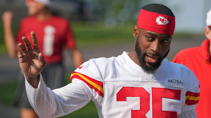 Jul 22, 2024; St. Joseph, MO, USA; Kansas City Chiefs cornerback Jaylen Watson (35) waves to fans while walking down the hill from the locker room to the fields prior to training camp at Missouri Western State University. Mandatory Credit: Denny Medley-Imagn Images