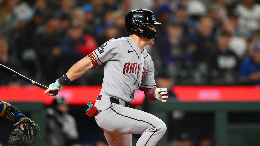 May 29, 2026; Seattle, Washington, USA; Arizona Diamondbacks right fielder Corbin Carroll (7) hits a single against the Seattle Mariners during the first inning at T-Mobile Park. Mandatory Credit: Steven Bisig-Imagn Images