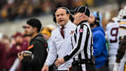 Oct 25, 2025; Iowa City, Iowa, USA; Minnesota Golden Gophers head coach P.J. Fleck reacts near a referee during the first quarter against the Iowa Hawkeyes at Kinnick Stadium. Mandatory Credit: Jeffrey Becker-Imagn Images