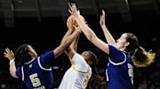 Notre Dame forward Liatu King (20) keeps the ball away from Georgia Tech guard Tonie Morgan (5) and center Ariadna Termis (20) during a NCAA women's basketball game between Notre Dame and Georgia Tech at Purcell Pavilion on Thursday, Jan. 16, 2025, in South Bend.