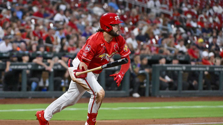 Aug 7, 2024; St. Louis, Missouri, USA;  St. Louis Cardinals first baseman Alec Burleson (41) hits a two run double against the Tampa Bay Rays during the fourth inning at Busch Stadium. Mandatory Credit: Jeff Curry-USA TODAY Sports