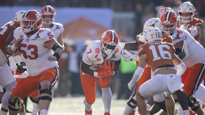 Dec 21, 2024; Austin, Texas, USA; Clemson Tigers running back Phil Mafah (7) against the Texas Longhorns during the first half of the CFP National playoff first round at Darrell K Royal-Texas Memorial Stadium. Dec 21, 2024; Austin, Texas, USA; Clemson Tigers running back Phil Mafah (7) against the Texas Longhorns during the first half of the CFP National playoff first round at Darrell K Royal-Texas Memorial Stadium.