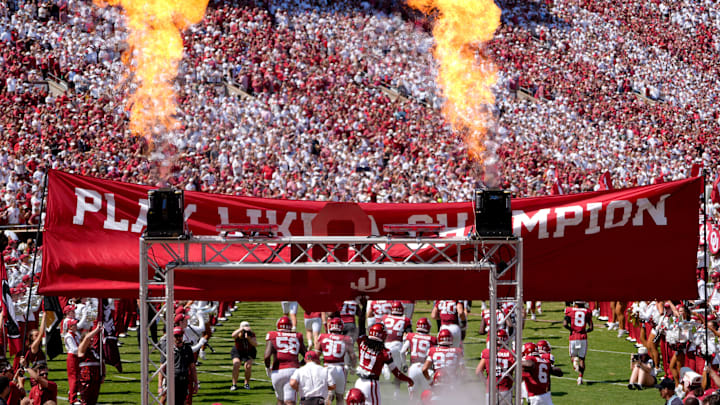 The Sooners take the field before a sea of home fans during a college football game between the University of Oklahoma Sooners (OU) and the Tulane Green Wave at Gaylord Family - Oklahoma Memorial Stadium in Norman, Okla., Saturday, Sept. 14, 2024.