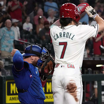 Sep 11, 2024; Phoenix, Arizona, USA; Arizona Diamondbacks outfielder Randal Grichuk (15) celebrates with Corbin Carroll (7) after hitting a two-run home run and 200th of his career against the Texas Rangers in the first inning at Chase Field. Mandatory Credit: Rick Scuteri-Imagn Images