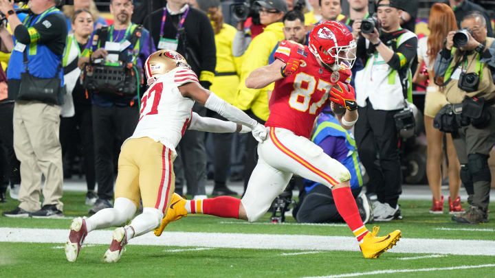 Feb 11, 2024; Paradise, Nevada, USA; San Francisco 49ers safety Ji'Ayir Brown (27) knocks Kansas City Chiefs tight end Travis Kelce (87) out of bounds during the fourth quarter of Super Bowl LVIII at Allegiant Stadium. Mandatory Credit: Kyle Terada-USA TODAY Sports