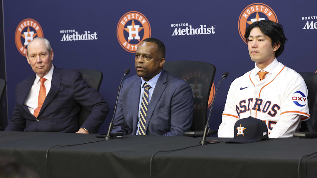 Jan 5, 2026; Houston, TX, USA; Houston Astros general manager Dana Brown (middle) talks and owner Jim Crane (left) looks on during a press conference to introduce Japanese pitcher Tatsuya Imai at Daikin Park.