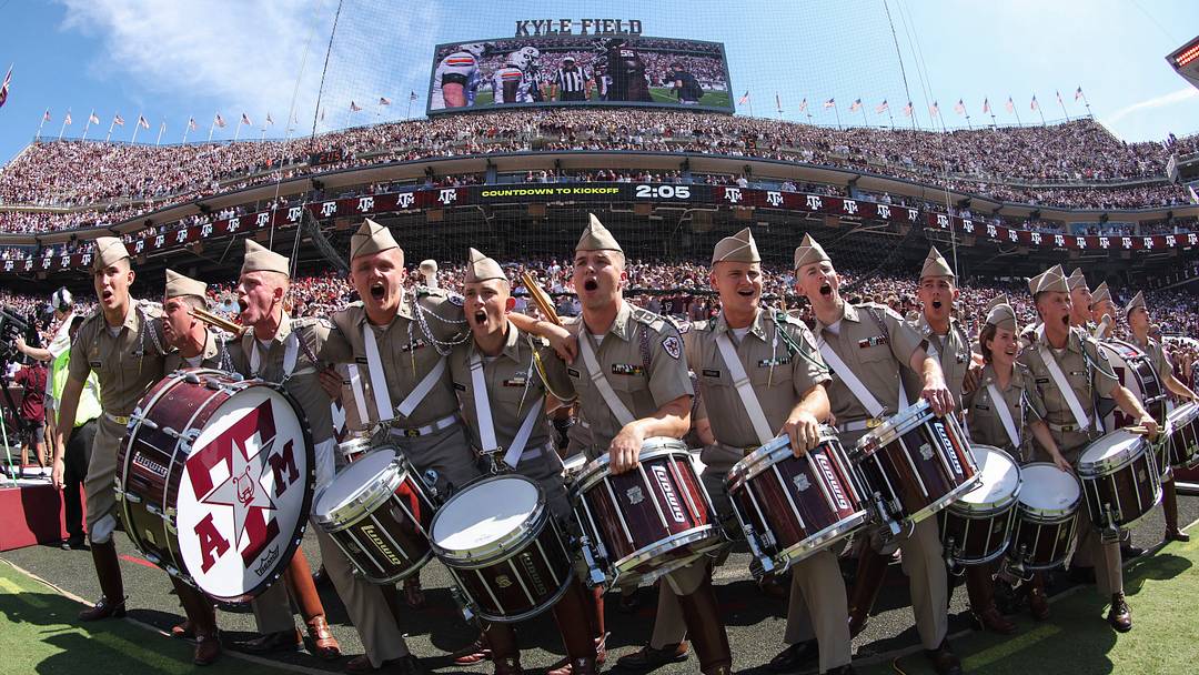 Texas A&M Aggies corps of cadet members cheer before the game against the Auburn Tigers at Kyle Field. 